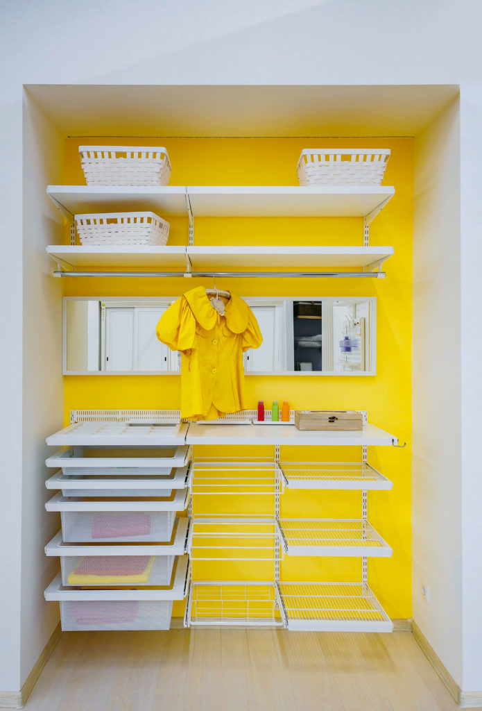 iStock 869698110 695x1024 - 7 Tips to Organizing a Small Closet Space